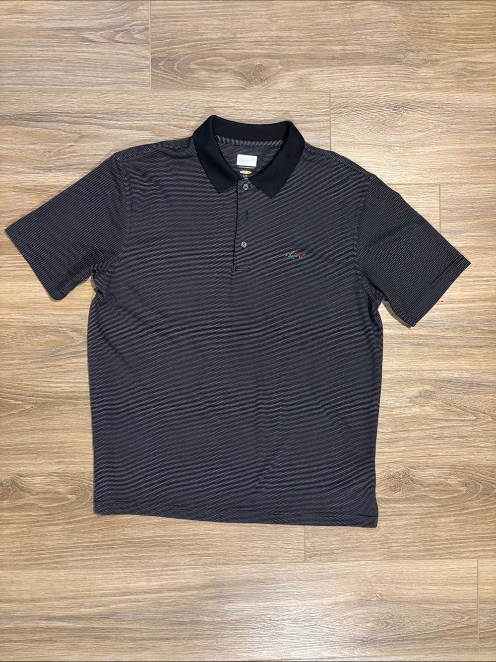 Greg Norman Collection Black Short Sleeve Polo with Subtle Logo